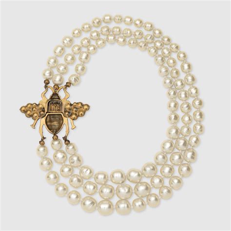 gucci bee necklace with pearl|Gucci bee collection.